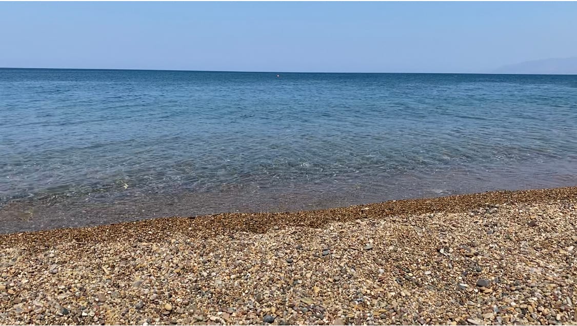The unspoilt sand and clear shallow water of Latchi beach